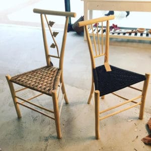 Two Triangular-Shaped Gentlemans Chairs In The Pop-Up Shop