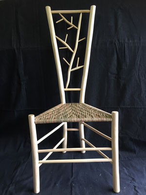 Gentleman's chair with winter branches back and paper rush seat