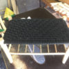 double sized footstool with magazine under side and black top