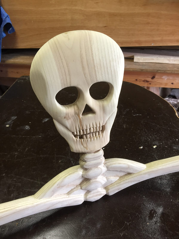 Close up image of Hand-carved skull in the Rustic Ash Chairs Skeleton Chair