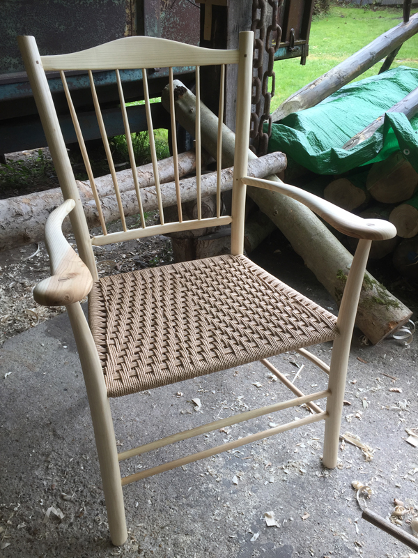 low spindle back Uncle Fred chair with shaped arms and cord seat